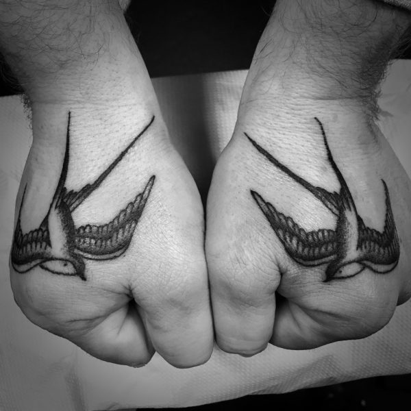 Jim MacAirt is a veteran tattoo artist and painter whose career spans over four decades. He began his artistic journey in the late 1970s with a focus on printmaking, before transitioning into tattooing in the early 1990s. Jim owned and operated Good Karma Tattoo Studio in Eastbourne, where he mentored numerous artists, including Thomas, who began his tattooing journey there. ￼