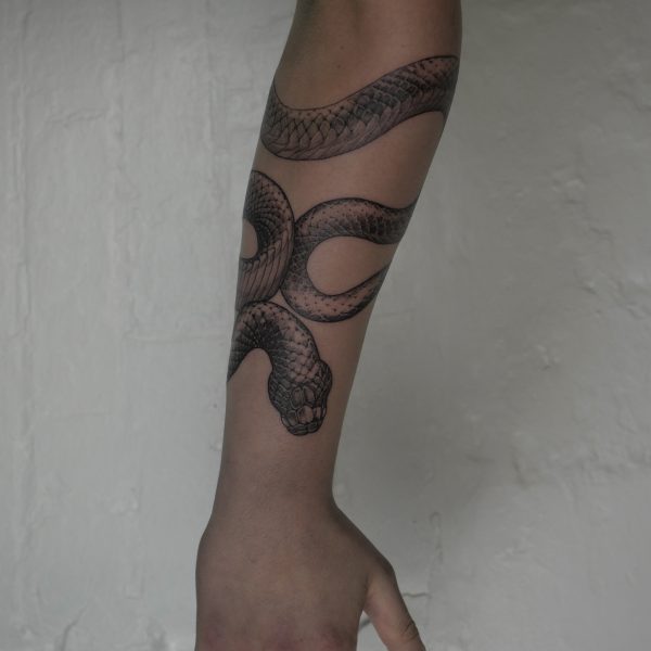 Detailed tattoo by Alex Rufio showcasing clean lines and strong composition, blending illustrative and realistic styles. Inspired by European Renaissance and postwar artists, Alex’s work balances classic influences with modern execution, creating timeless custom pieces.