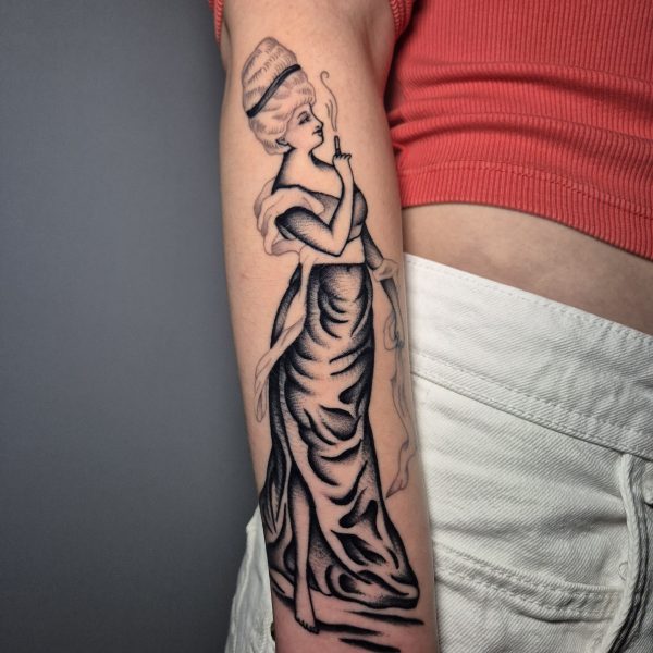 European traditional tattoo by Edoardo Cucchelli, featuring clean, early 1900s-inspired design with bold lines and a classic black and limited-colour palette. Edo works from Nowhere Tattooing in Brighton, creating timeless, readable tattoos influenced by Classicism and Renaissance art.