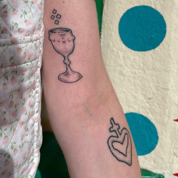 Holy grail stick and poke tattoo by Nowhere Tattoo shops resident artist Rhianna I'Anson. From Brighton herself, Rhianna brings a distinct and highly different style to the current UK tattoo scene that is fresh, playful, and fun.