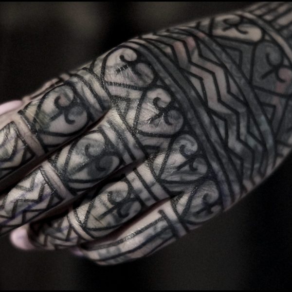 Bold blackwork tattoo by Francesco Capro, featuring strong ornamental patterns and timeless design. Francesco, originally from Northern Italy, works from Nowhere Tattooing in Brighton and Seven Doors Tattoo in London, bringing over thirteen years of experience and a passion for powerful, culturally rich tattoo art.