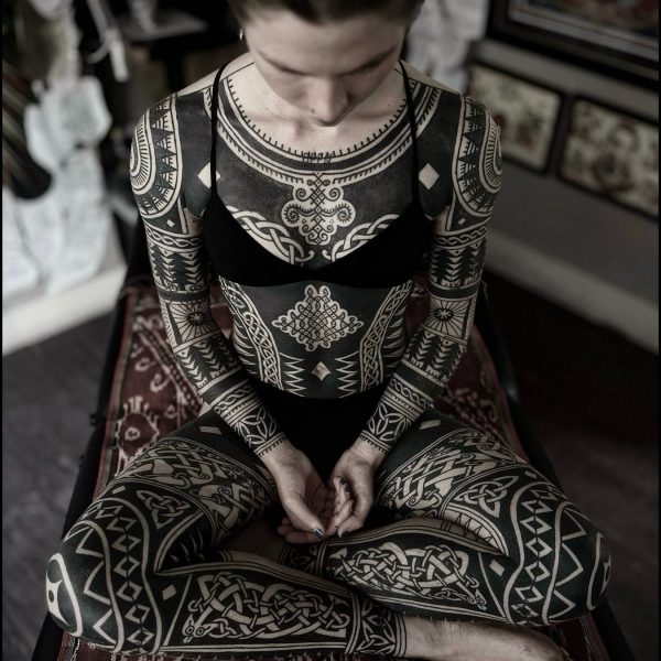 Bold blackwork tattoo by Francesco Capro, featuring strong ornamental patterns and timeless design. Francesco, originally from Northern Italy, works from Nowhere Tattooing in Brighton and Seven Doors Tattoo in London, bringing over thirteen years of experience and a passion for powerful, culturally rich tattoo art.