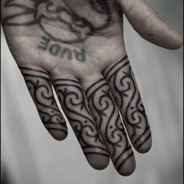 Bold blackwork tattoo by Francesco Capro, featuring strong ornamental patterns and timeless design. Francesco, originally from Northern Italy, works from Nowhere Tattooing in Brighton and Seven Doors Tattoo in London, bringing over thirteen years of experience and a passion for powerful, culturally rich tattoo art.